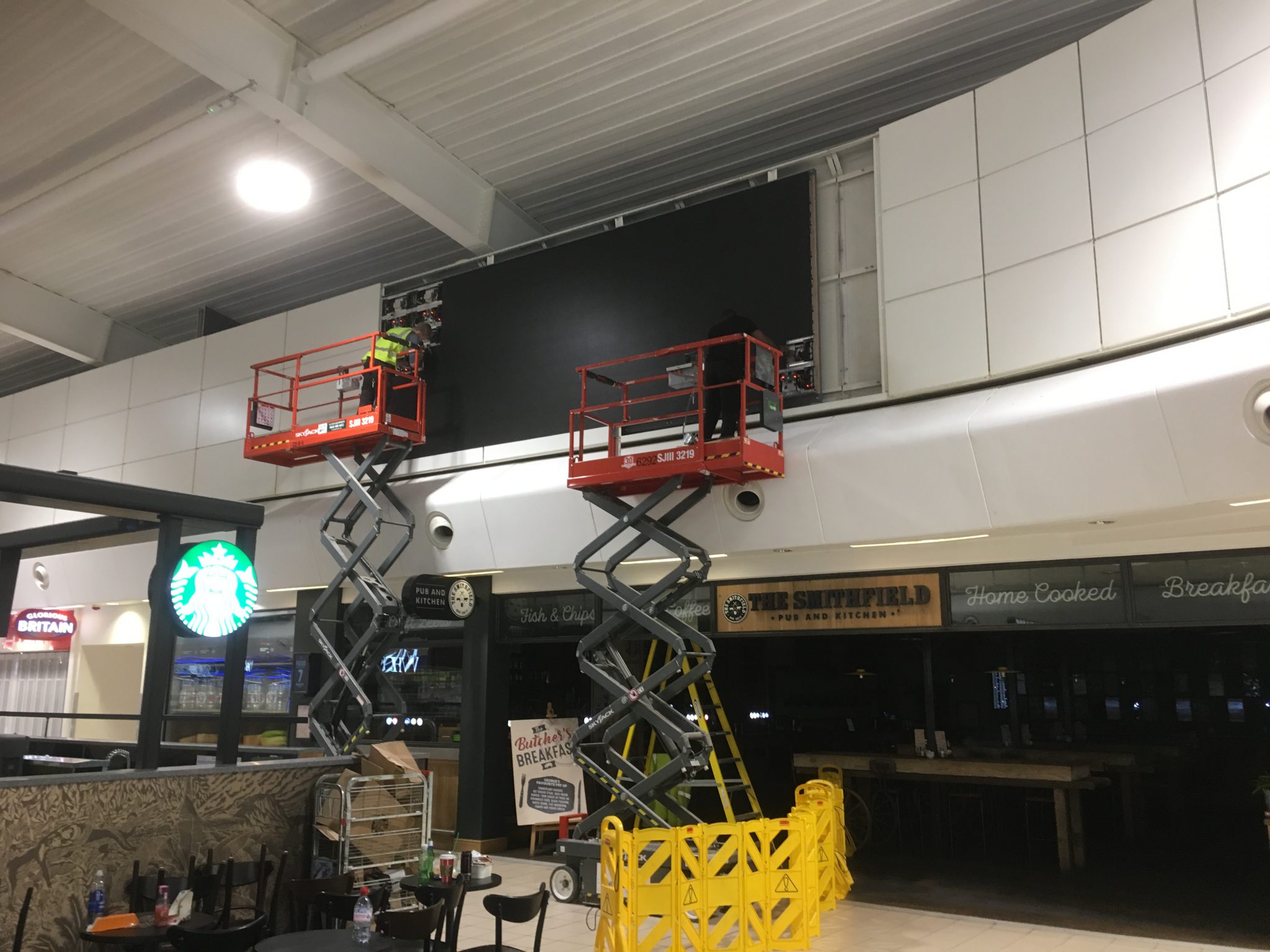 Health and Safety - LED Wall installation using scissor lifts at London Luton Airport